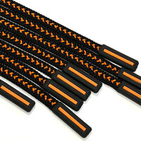 Шнур круглый косичка 7мм, 100пэ, цв черный/оранжевый, наконечник силикон, 130см (уп 10шт)